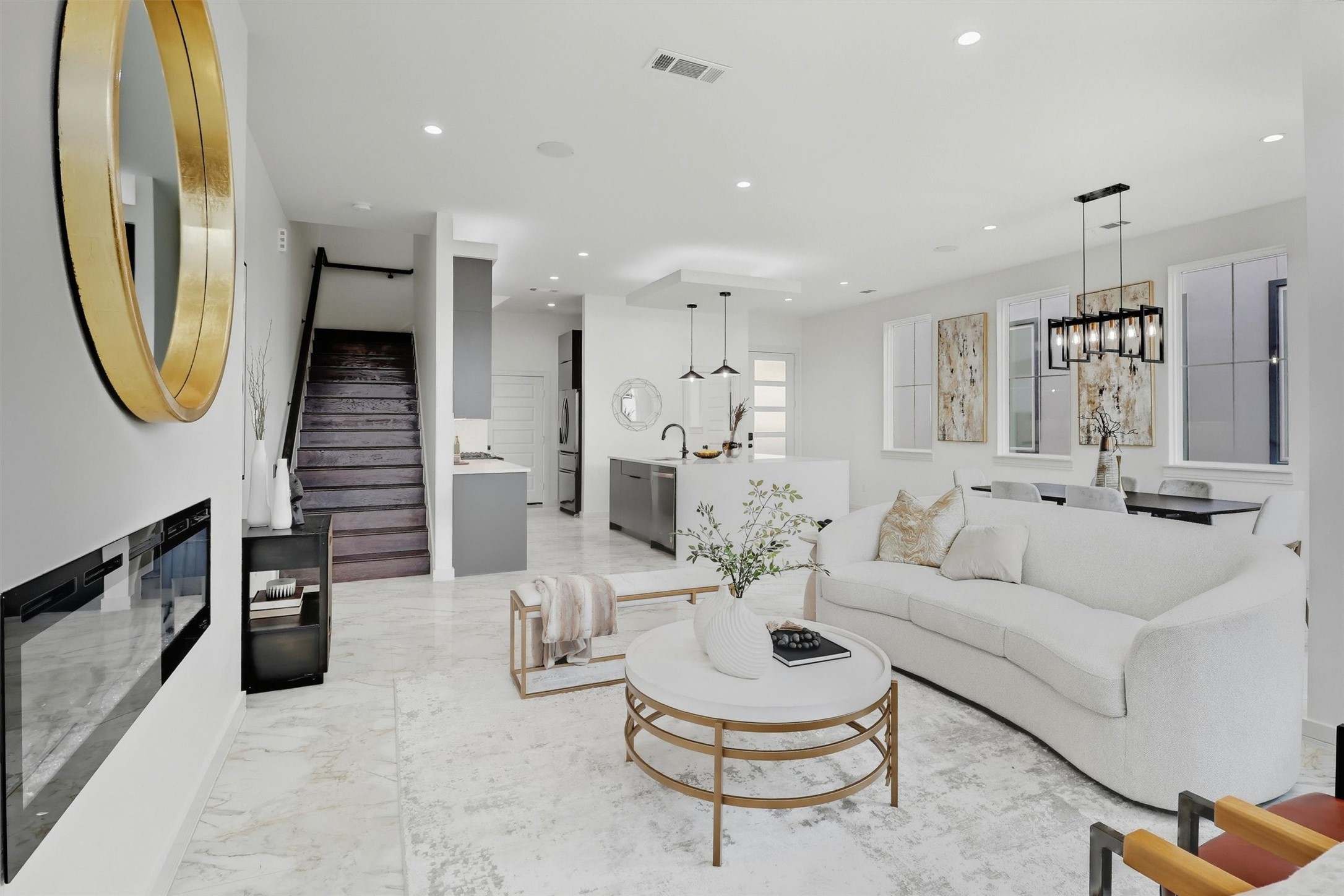 2939 El Fenice Lane Houston, TX 77057 - Photo 25 of 48 a living room with furniture a rug and kitchen view