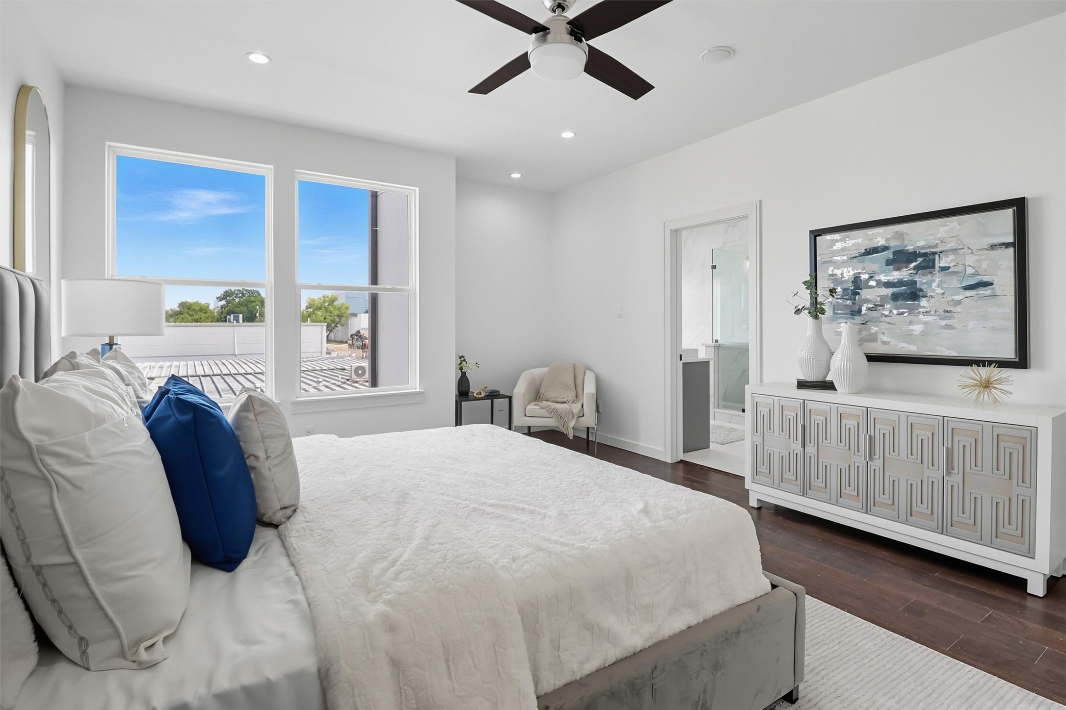 2939 El Fenice Lane Houston, TX 77057 - Photo 27 of 48 a bedroom with a large bed and a window