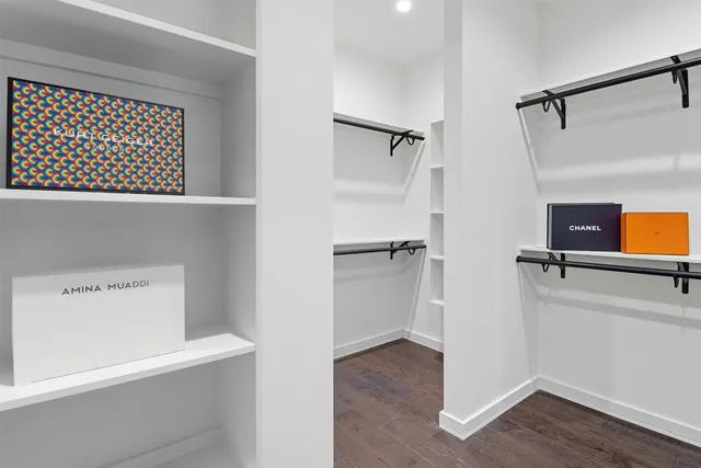 a view of a dining room with furniture and a rug