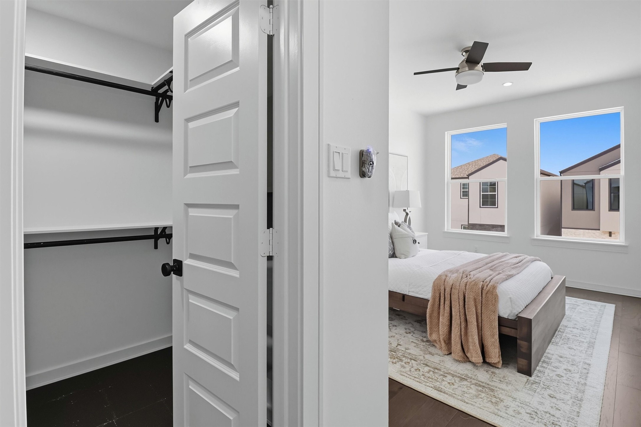 2939 El Fenice Lane Houston, TX 77057 - Photo 37 of 48 a bedroom with a bed and a ceiling fan