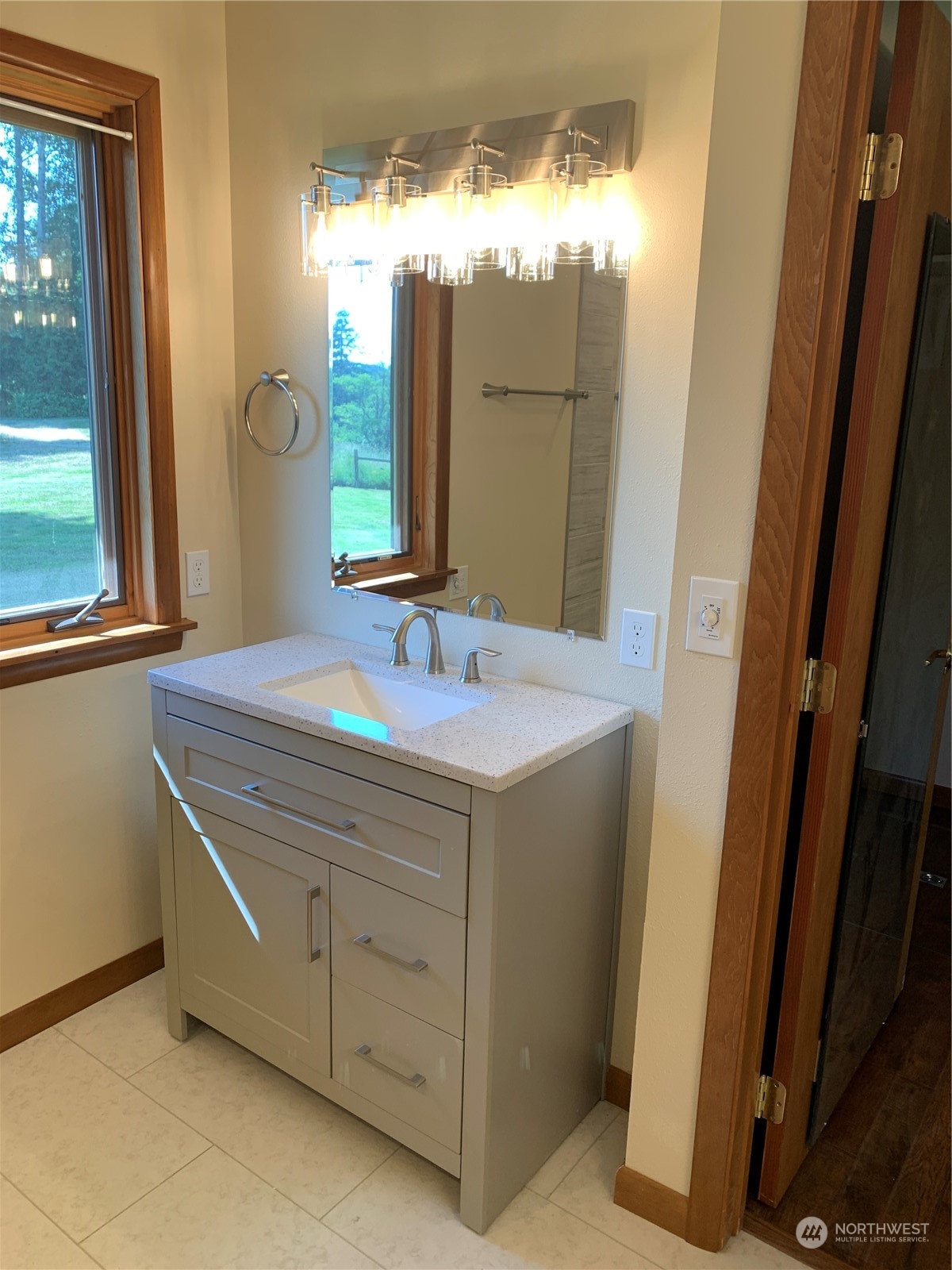 7445 Valley View Road Ferndale, WA 98248 - Photo 15 of 39 a bathroom with a sink and a mirror