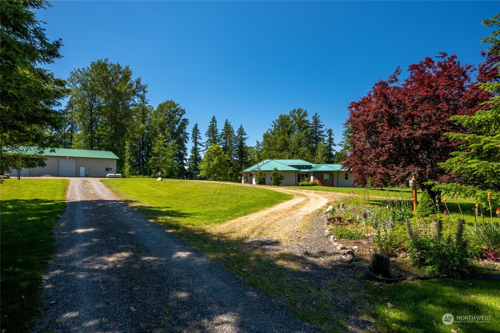 7445 Valley View Road Ferndale, WA 98248 - Photo 2 of 39 a view of a swimming pool with a yard