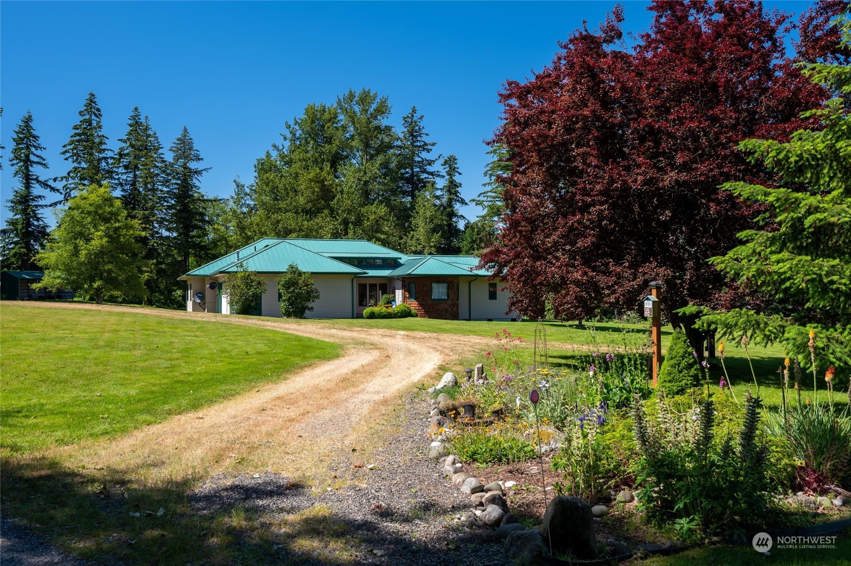 7445 Valley View Road Ferndale, WA 98248 - Photo 29 of 39 a view of a house with a yard