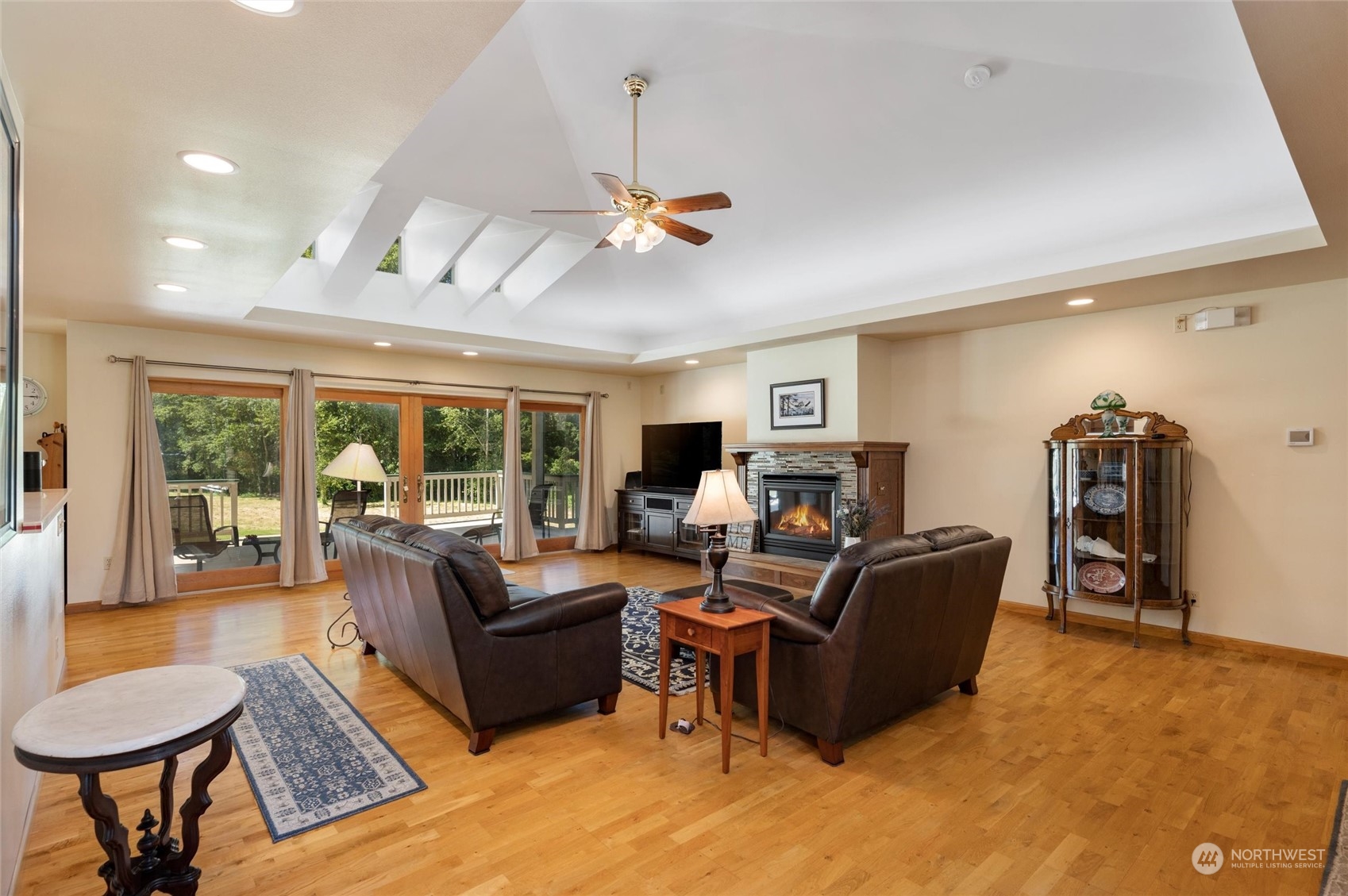 7445 Valley View Road Ferndale, WA 98248 - Photo 4 of 39 a living room with furniture a ceiling fan and a window