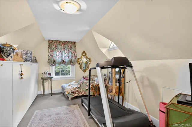 a view of a livingroom with furniture and windows