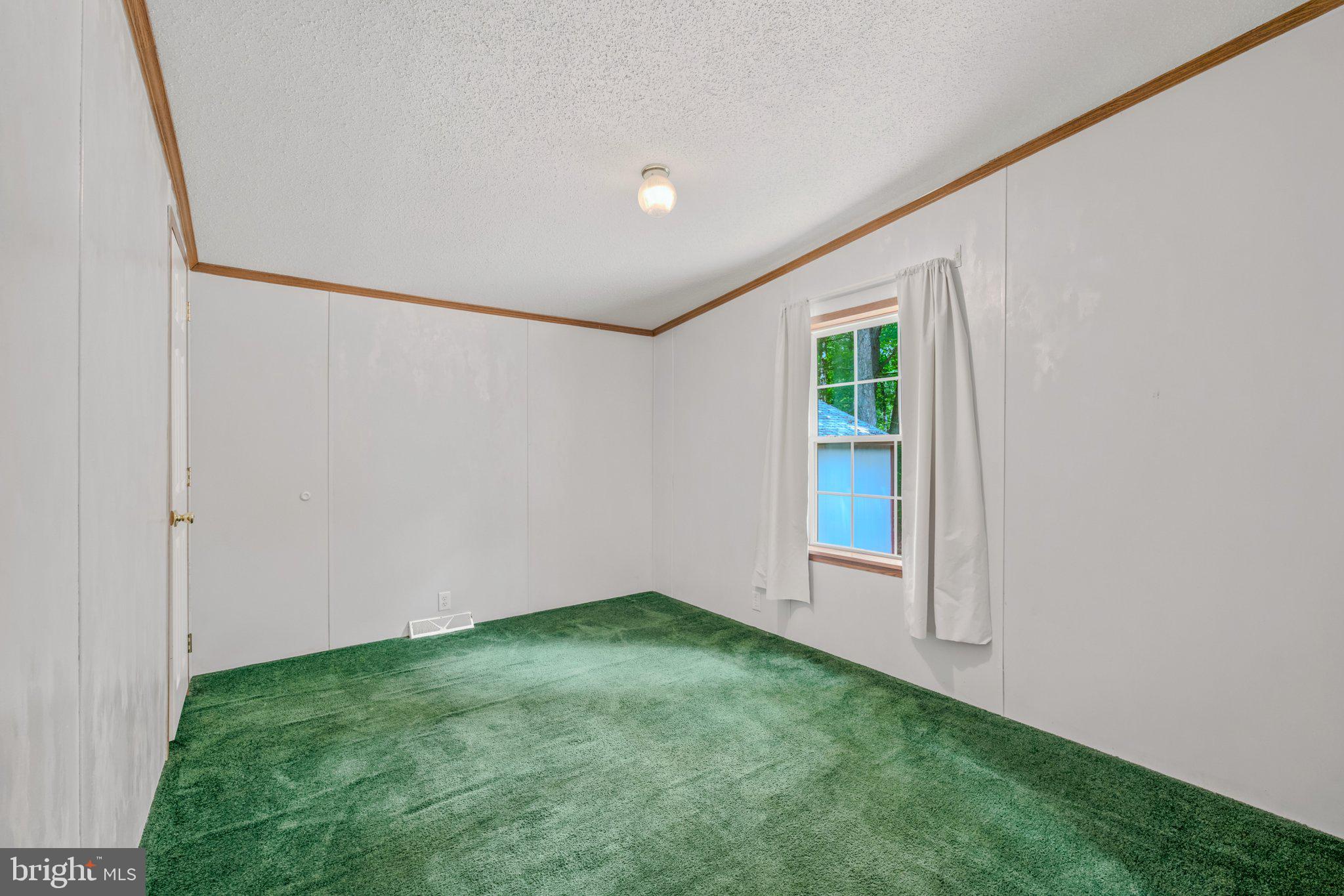 193 Co Rte 9/15 Berkeley Springs, WV 25411 - Photo 22 of 32 Bedroom 3