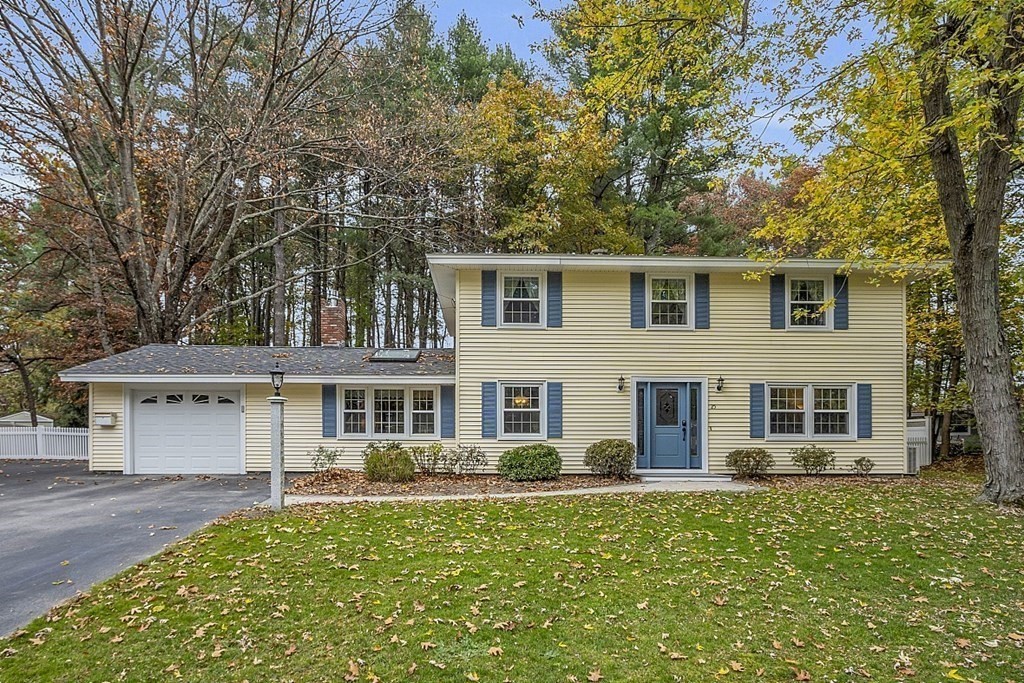 25 Ansie Road Chelmsford, MA 01824 - Photo 11 of 41 front view of a house with a yard