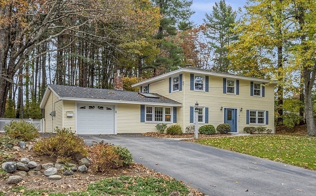 25 Ansie Road Chelmsford, MA 01824 - Photo 12 of 41 front view of a house with a yard