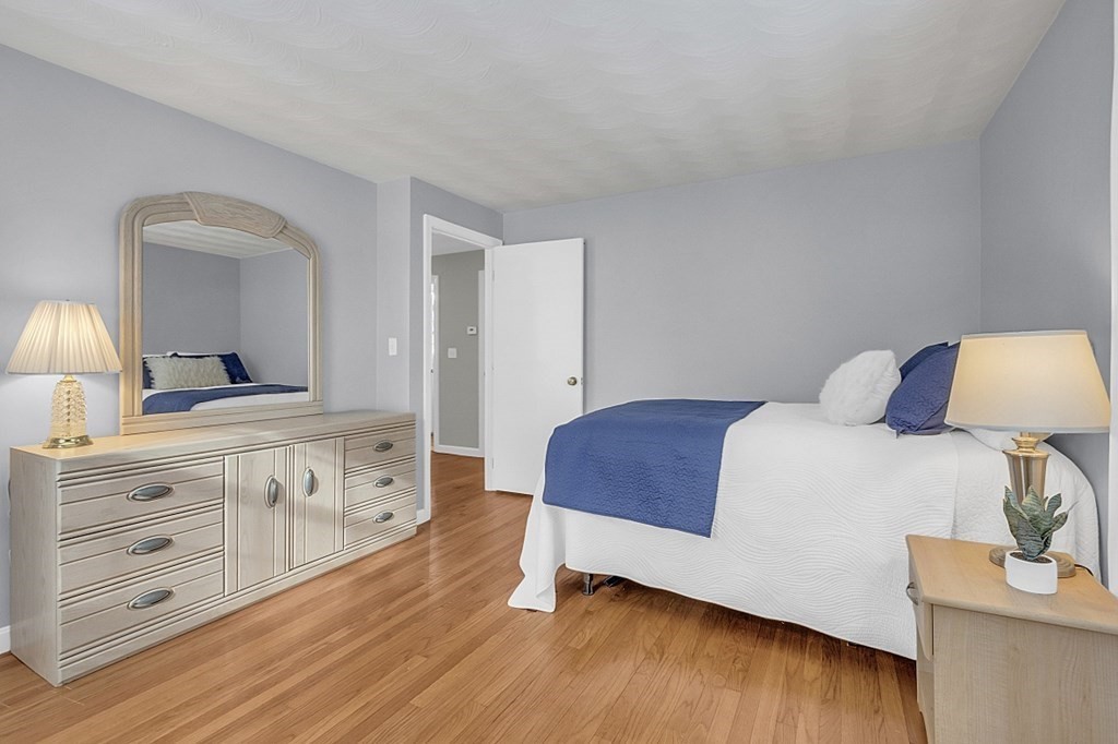 25 Ansie Road Chelmsford, MA 01824 - Photo 30 of 41 a bedroom with a bed and a dresser