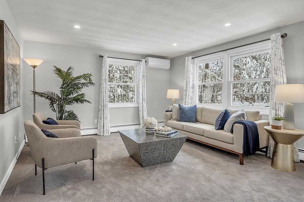 25 Ansie Road Chelmsford, MA 01824 - Photo 3 of 41 a living room with furniture and a large window