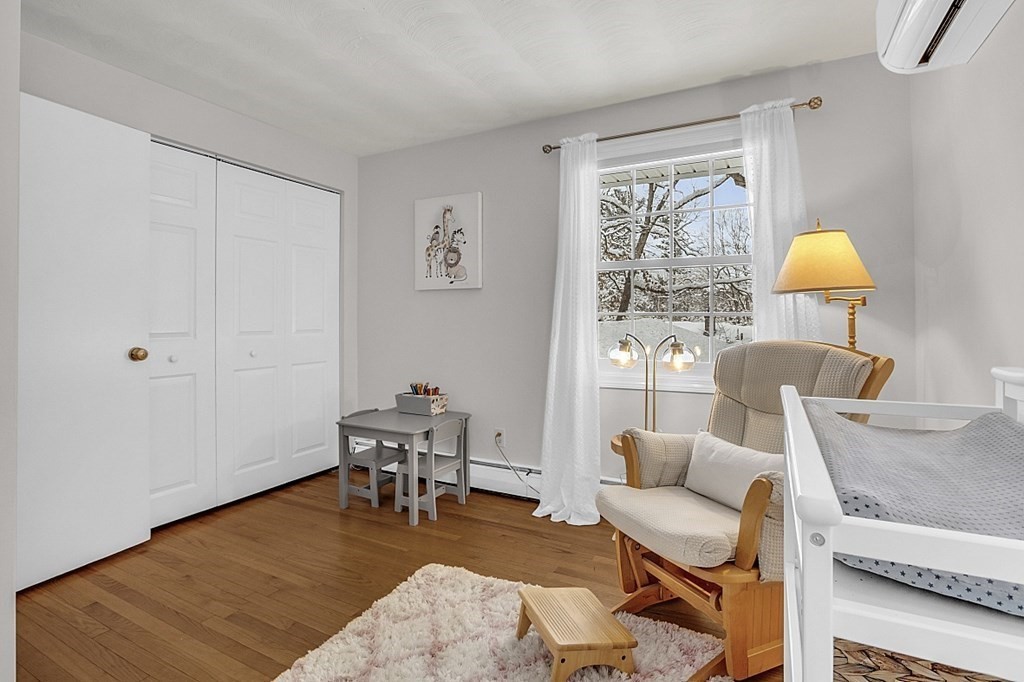 25 Ansie Road Chelmsford, MA 01824 - Photo 34 of 41 a living room with furniture and a table