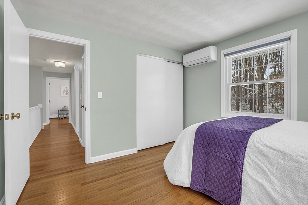 25 Ansie Road Chelmsford, MA 01824 - Photo 37 of 41 a spacious bedroom with a bed and a large window
