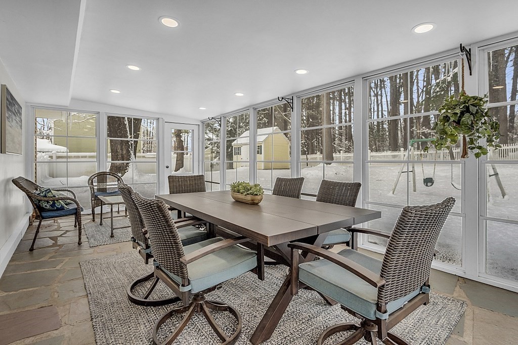 25 Ansie Road Chelmsford, MA 01824 - Photo 8 of 41 a view of a dining room with furniture window and wooden floor