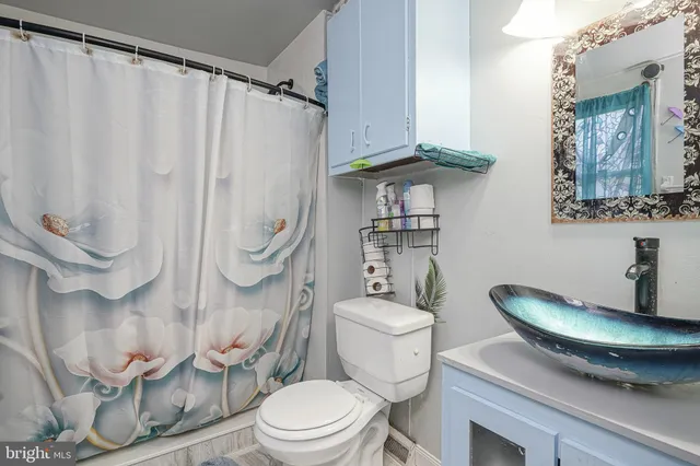 a wooden bench sitting in front of a lake