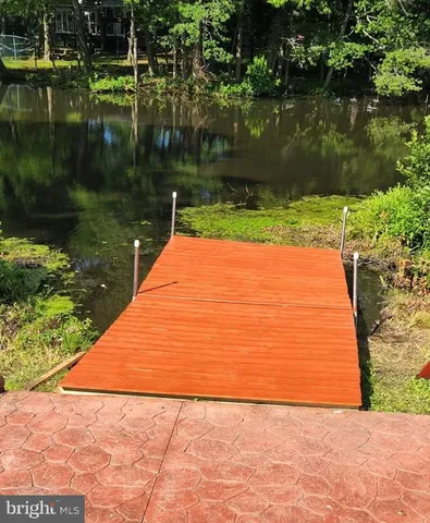 a view of a street with sitting area