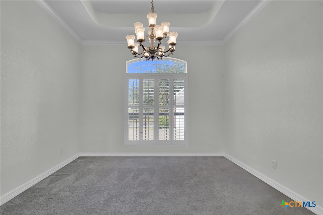 4703 Sunflower Lane Temple, TX 76502 - Photo 14 of 35 a view of a livingroom with a chandelier