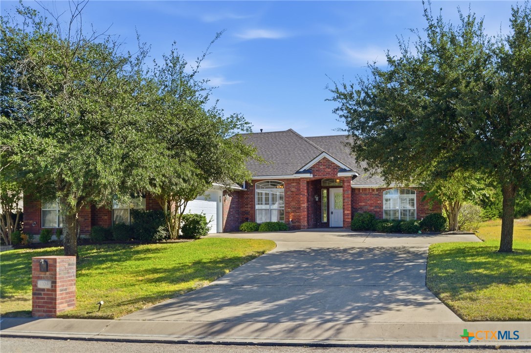 4703 Sunflower Lane Temple, TX 76502 - Photo 2 of 35 a front view of house with yard and green space