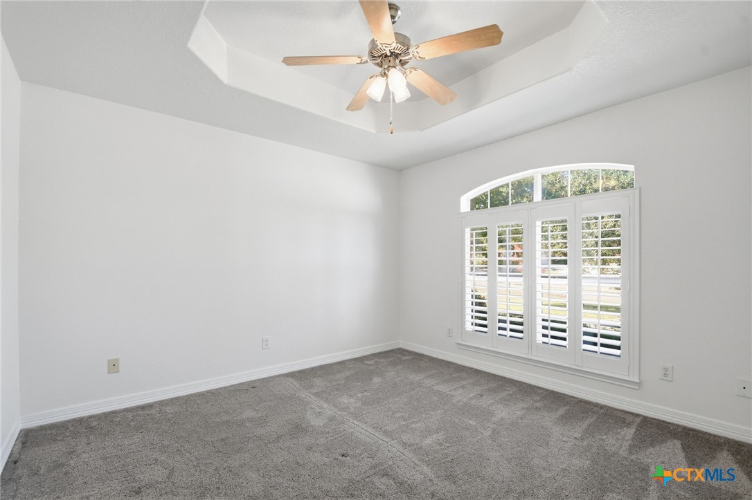 4703 Sunflower Lane Temple, TX 76502 - Photo 27 of 35 an empty room with windows and entrance