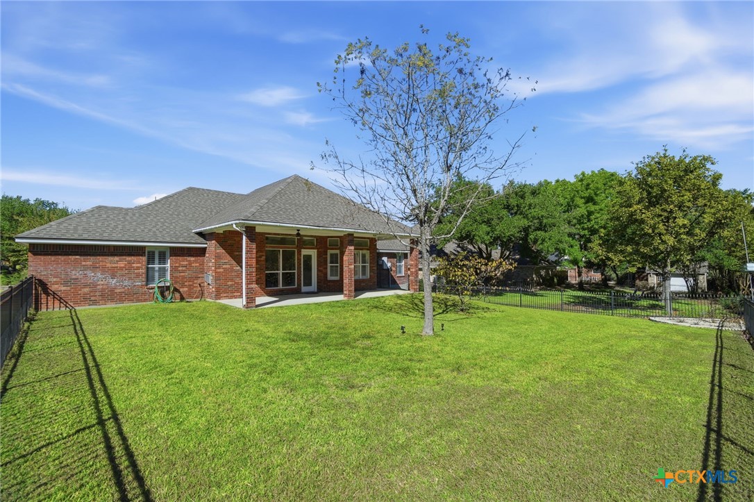 4703 Sunflower Lane Temple, TX 76502 - Photo 34 of 35 a view of a house with a backyard