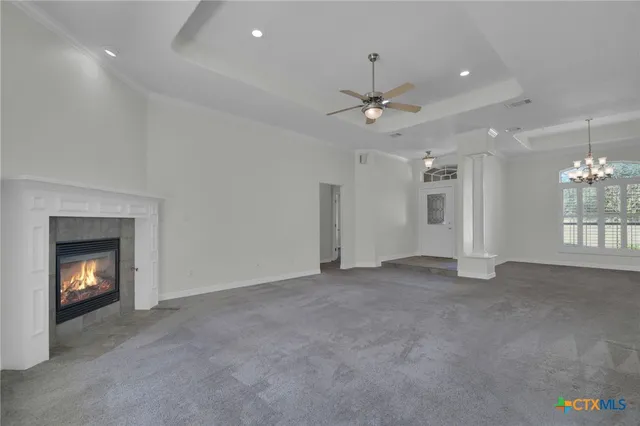 a kitchen with granite countertop a sink stove and cabinets