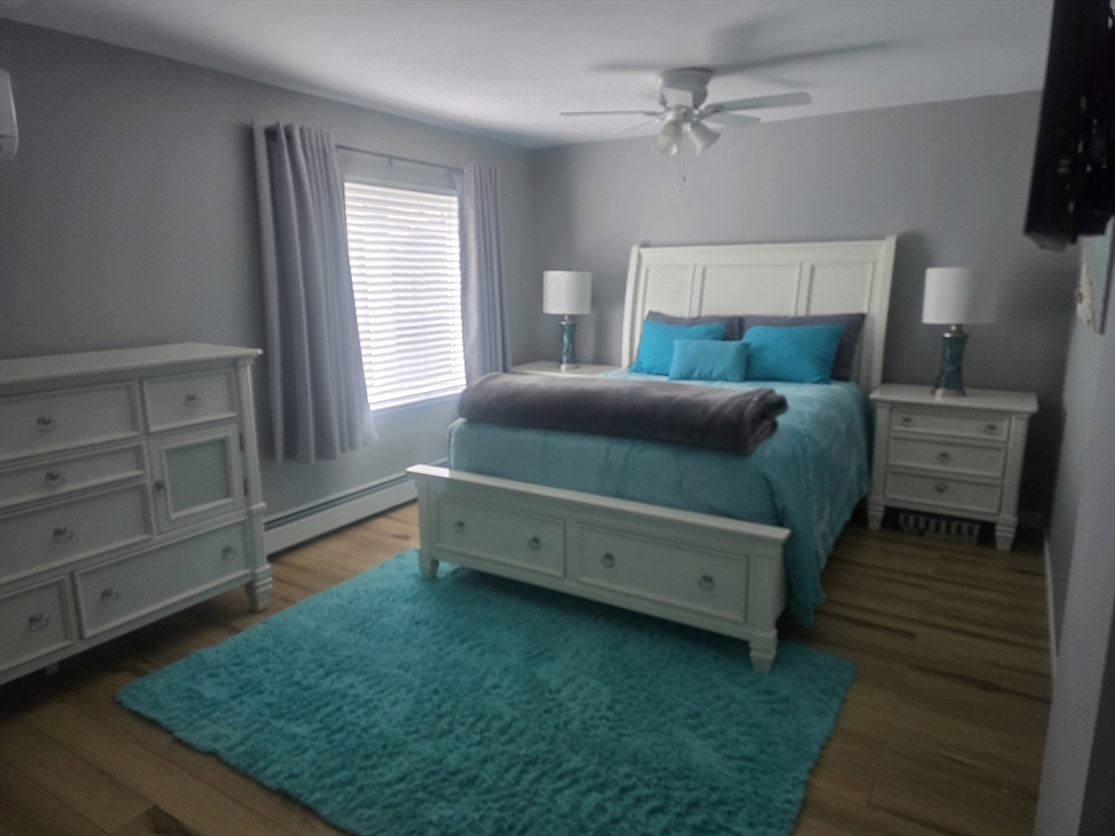 855 Somers Road East Longmeadow, MA 01028 - Photo 2 of 10 a bedroom with a bed and a window