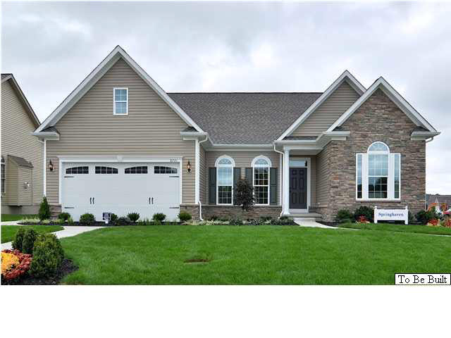 323 Ridgemont Road Ruckersville, VA 22968 - Photo 1 of 14 a front view of a house with a yard and trees