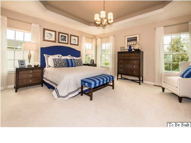 323 Ridgemont Road Ruckersville, VA 22968 - Photo 7 of 14 a spacious bedroom with a bed window and a couch