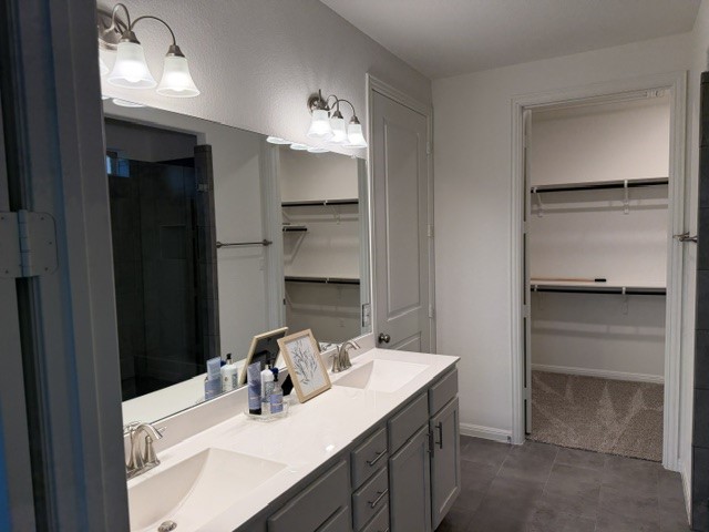 2016 Wooded Run Trail Georgetown, TX 78628 - Photo 11 of 16 Dual vanity with integrated sinks and brushed nickel fixtures