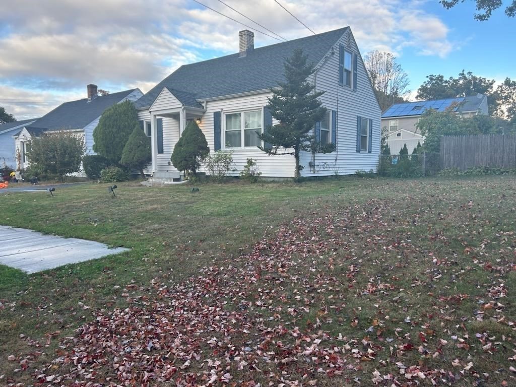 179 Powell Avenue Springfield, MA 01118 - Photo 2 of 30 a front view of a house with garden