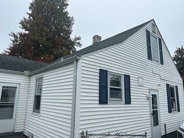 179 Powell Avenue Springfield, MA 01118 - Photo 5 of 30 a view of a house with a small porch