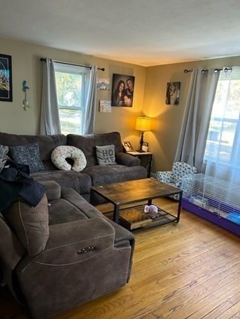 179 Powell Avenue Springfield, MA 01118 - Photo 8 of 30 a living room with furniture and a window