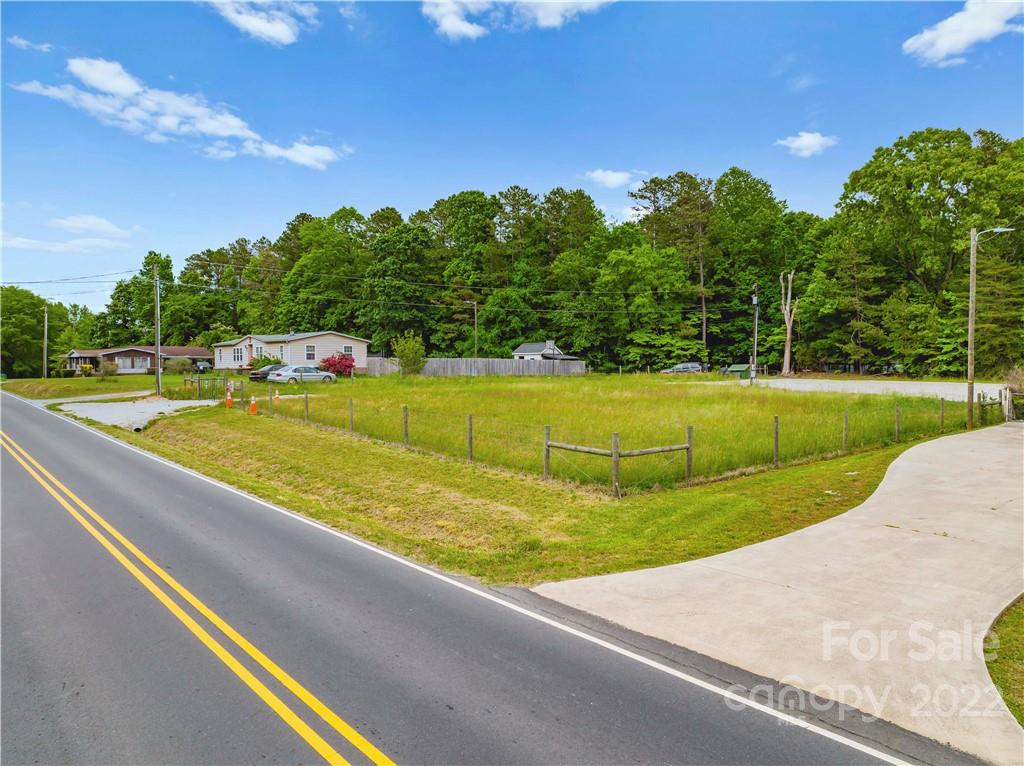 265 Goodson Road Salisbury, NC 28147 - Photo 5 of 7 a view of a swimming pool with a yard