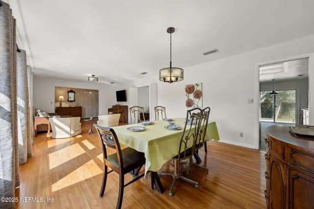a kitchen with stainless steel appliances a refrigerator sink and cabinets