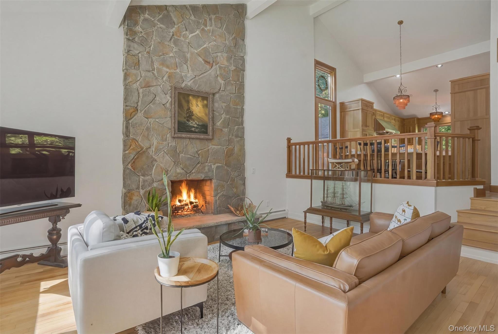 97 Walling Road Warwick, NY 10990 - Photo 40 of 43 Living Room featuring soaring fireplace in open floor plan living space.