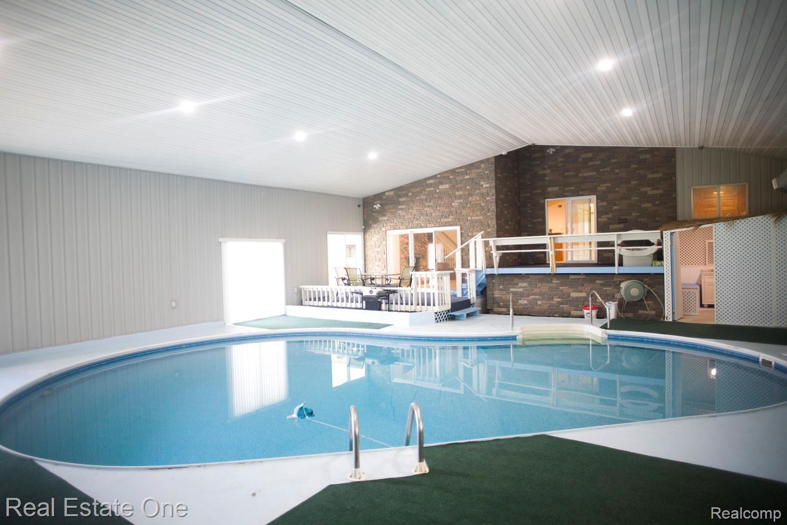 42560 Willis Road Belleville, MI 48111 - Photo 25 of 70 POOL ROOM, 2 TIERED DECK