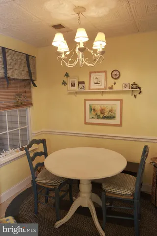 a view of a dining room with furniture