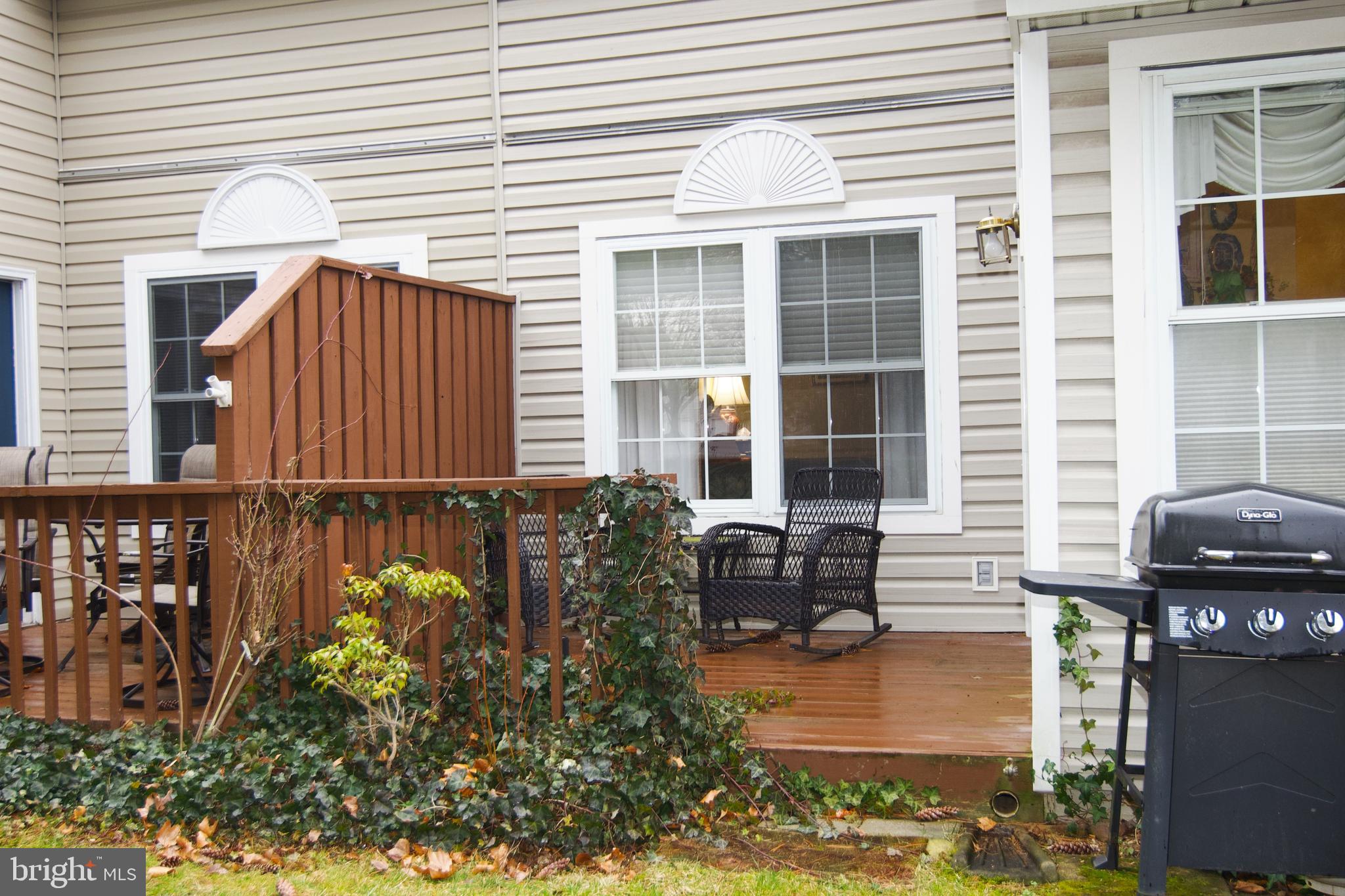162 Hawthorne Court Reading, PA 19610 - Photo 30 of 32 a backyard of a house with outdoor seating