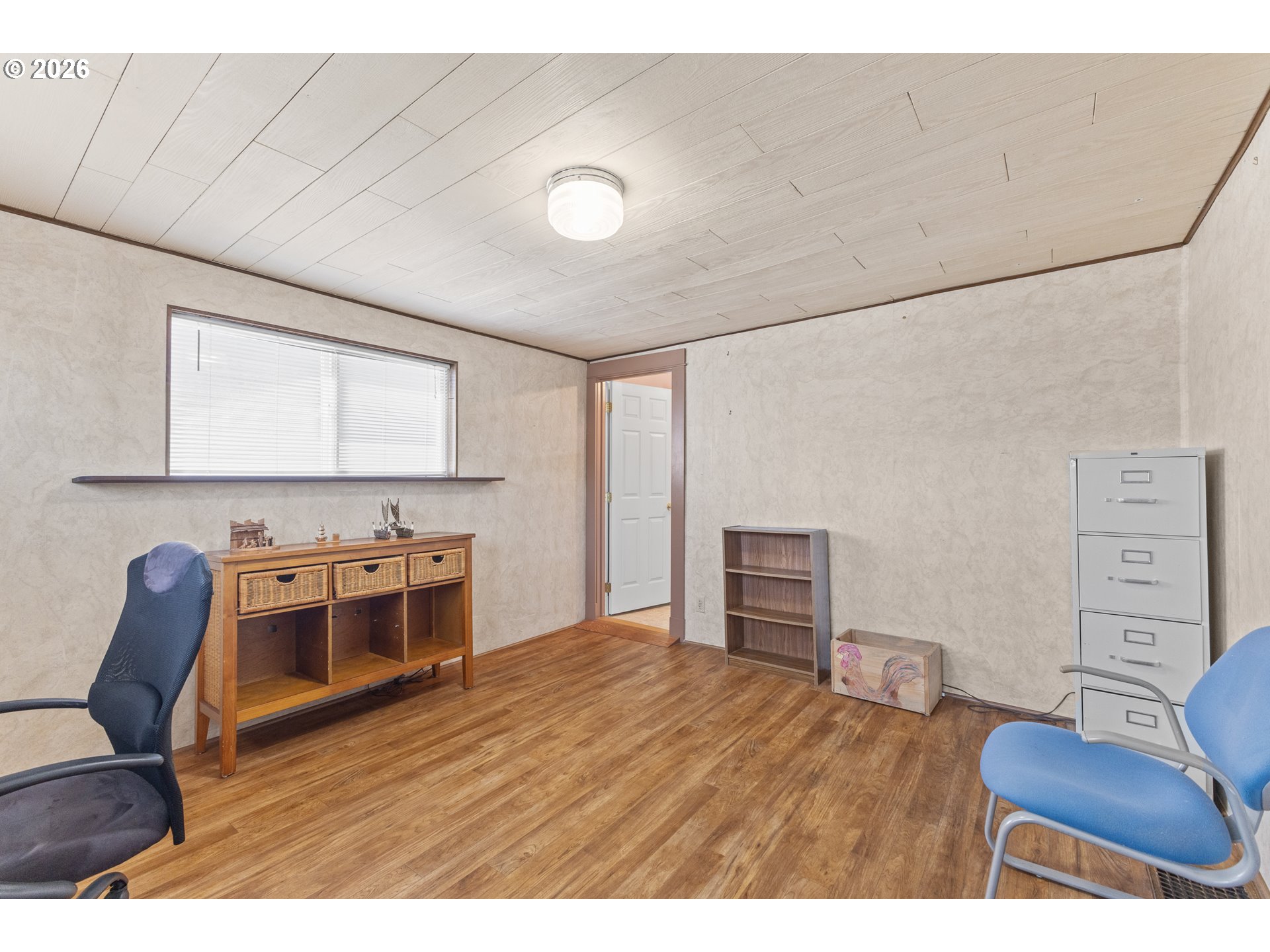 208 7th Street Myrtle Point, OR 97458 - Photo 35 of 48 a bedroom with furniture and wooden floor