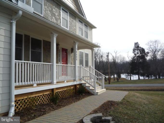 18800 Jerusalem Church Road Poolesville, MD 20837 - Photo 16 of 22 a balcony with a bench