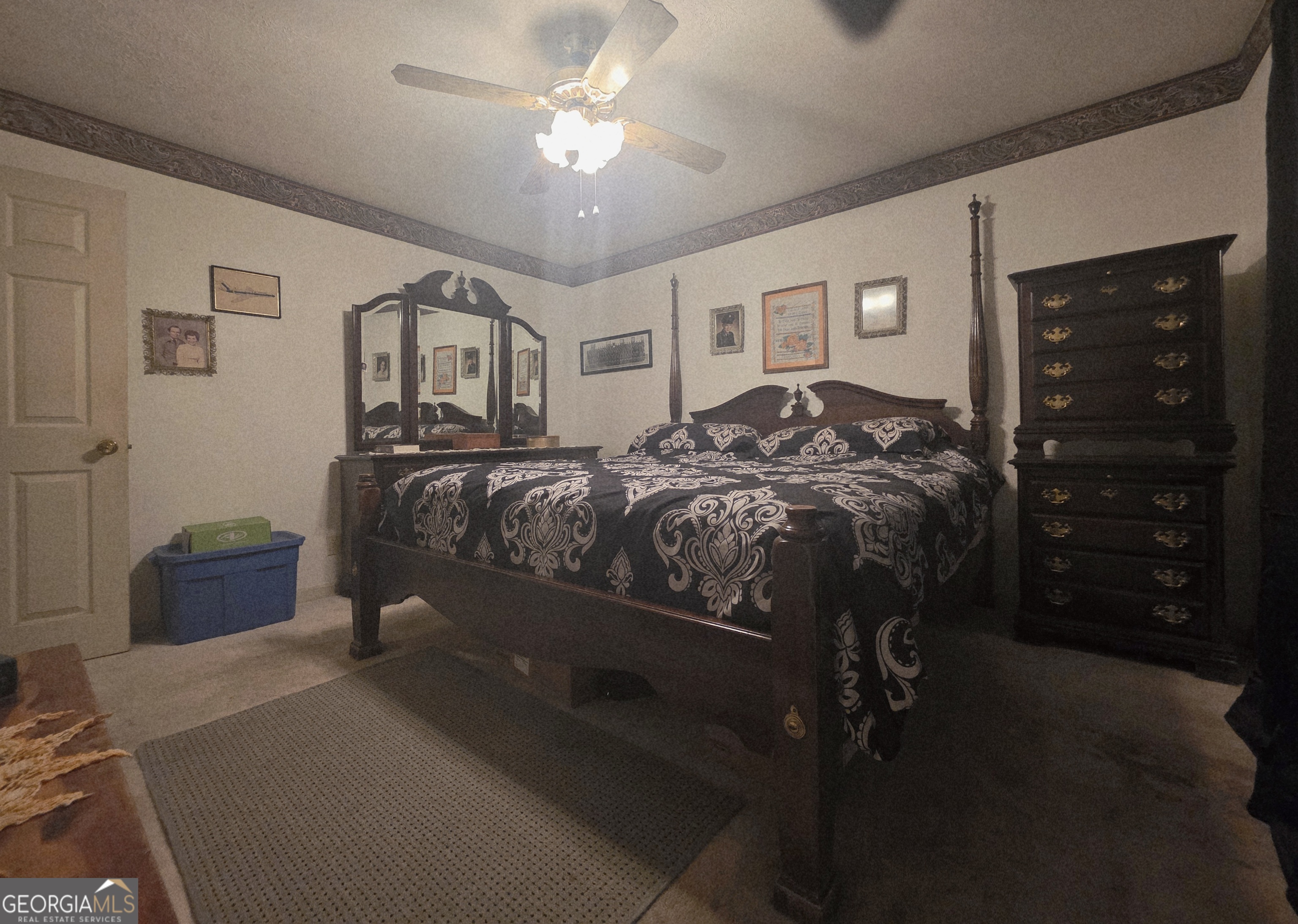 1407 Rainbow Circle Griffin, GA 30224 - Photo 13 of 23 a bedroom with a bed and a closet