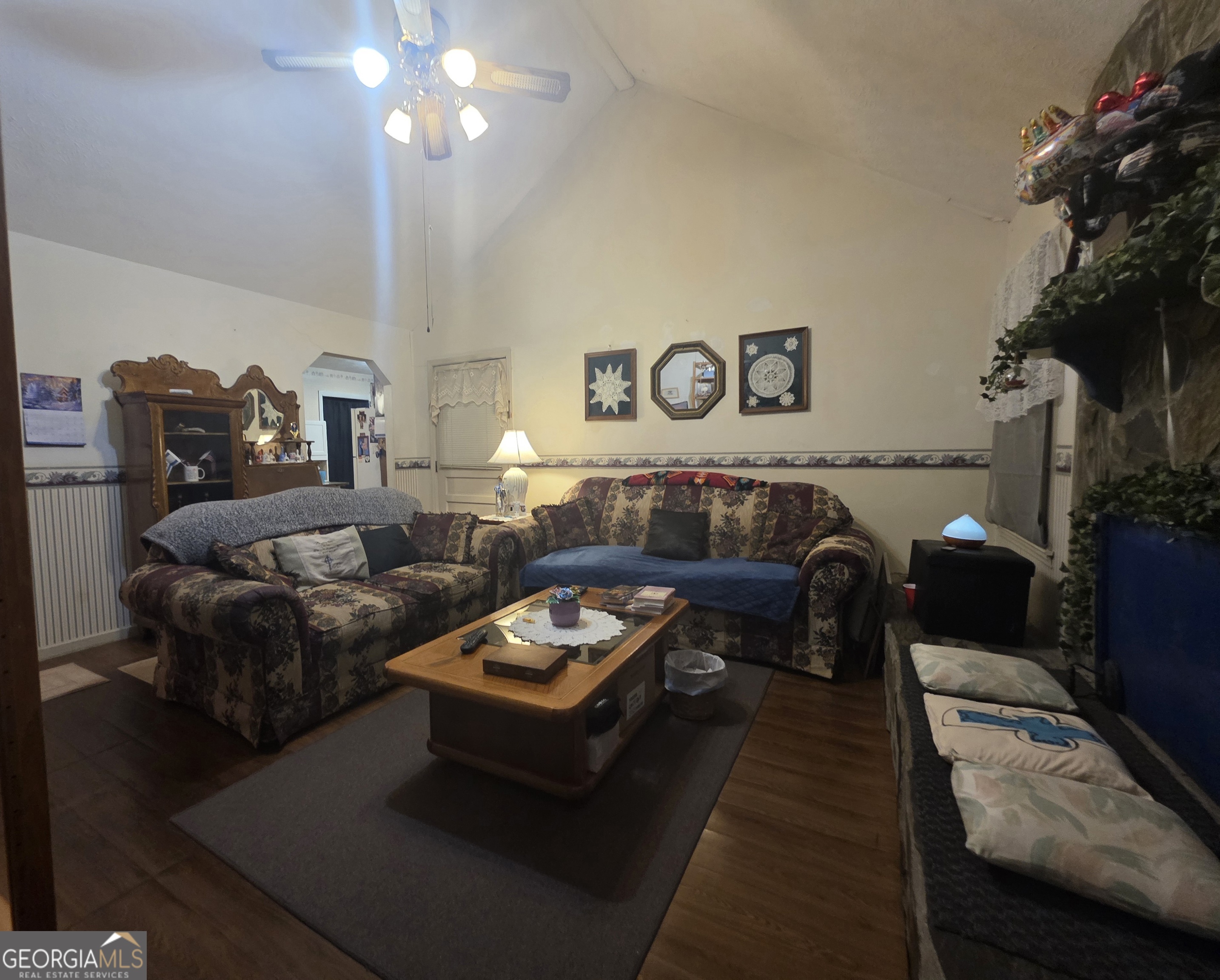 1407 Rainbow Circle Griffin, GA 30224 - Photo 4 of 23 a living room with furniture and a table