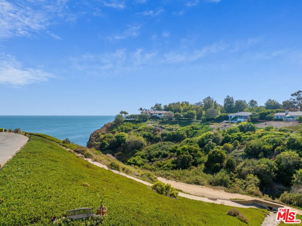 249 Paradise Cove Road Malibu, CA 90265 - Photo 32 of 41 a view of a lake with a yard