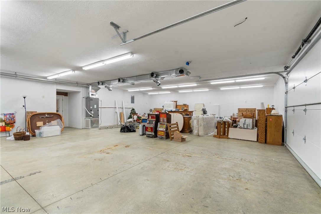 22840 Buck Road Alliance, OH 44601 - Photo 23 of 36 Garage featuring heating unit