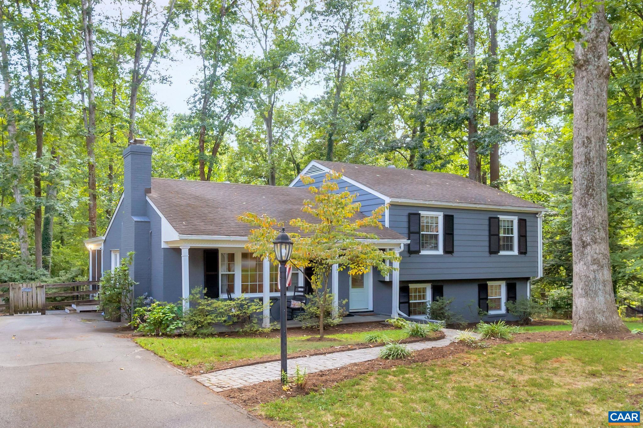 1717 Solomon Road Charlottesville, VA 22901 - Photo 1 of 41 a front view of a house with garden