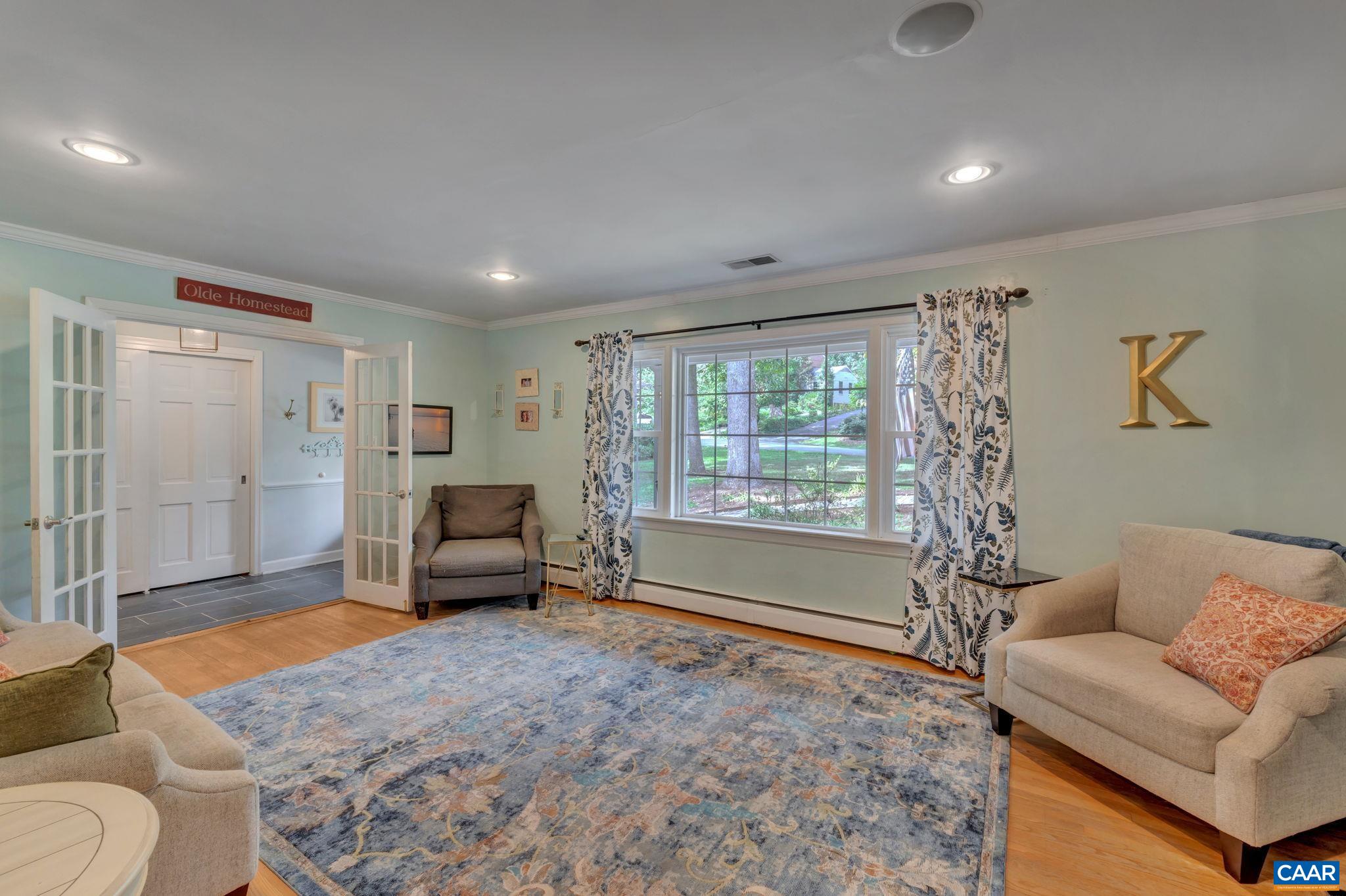1717 Solomon Road Charlottesville, VA 22901 - Photo 11 of 41 a living room with furniture and a couch