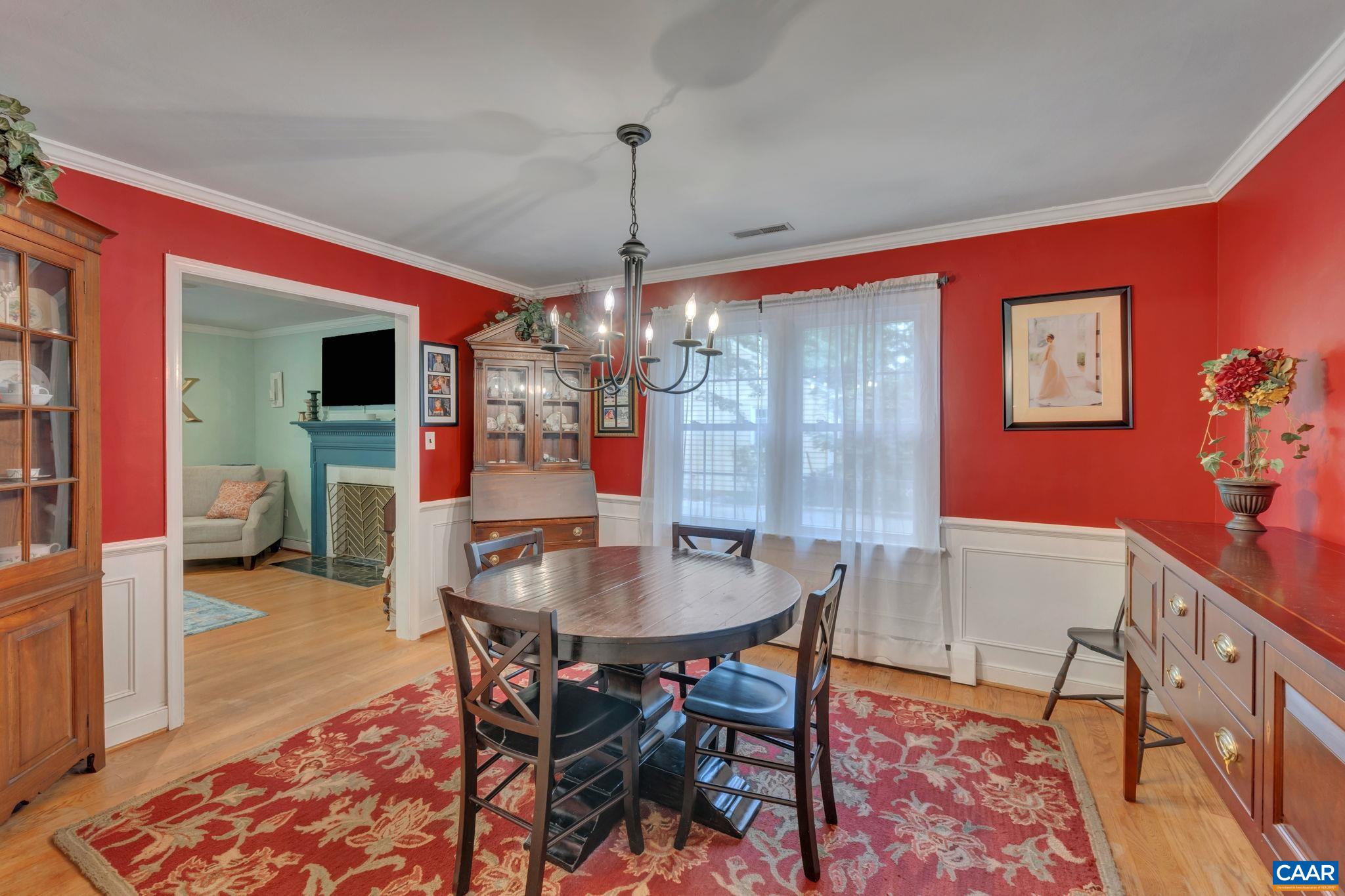 1717 Solomon Road Charlottesville, VA 22901 - Photo 12 of 41 a view of a dining room with furniture window and wooden floor