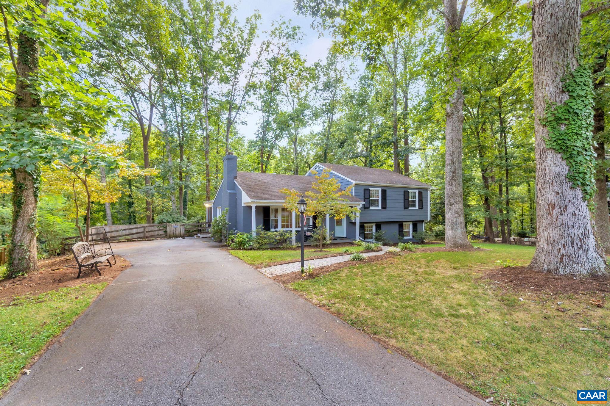 1717 Solomon Road Charlottesville, VA 22901 - Photo 3 of 41 a house with trees in front of it