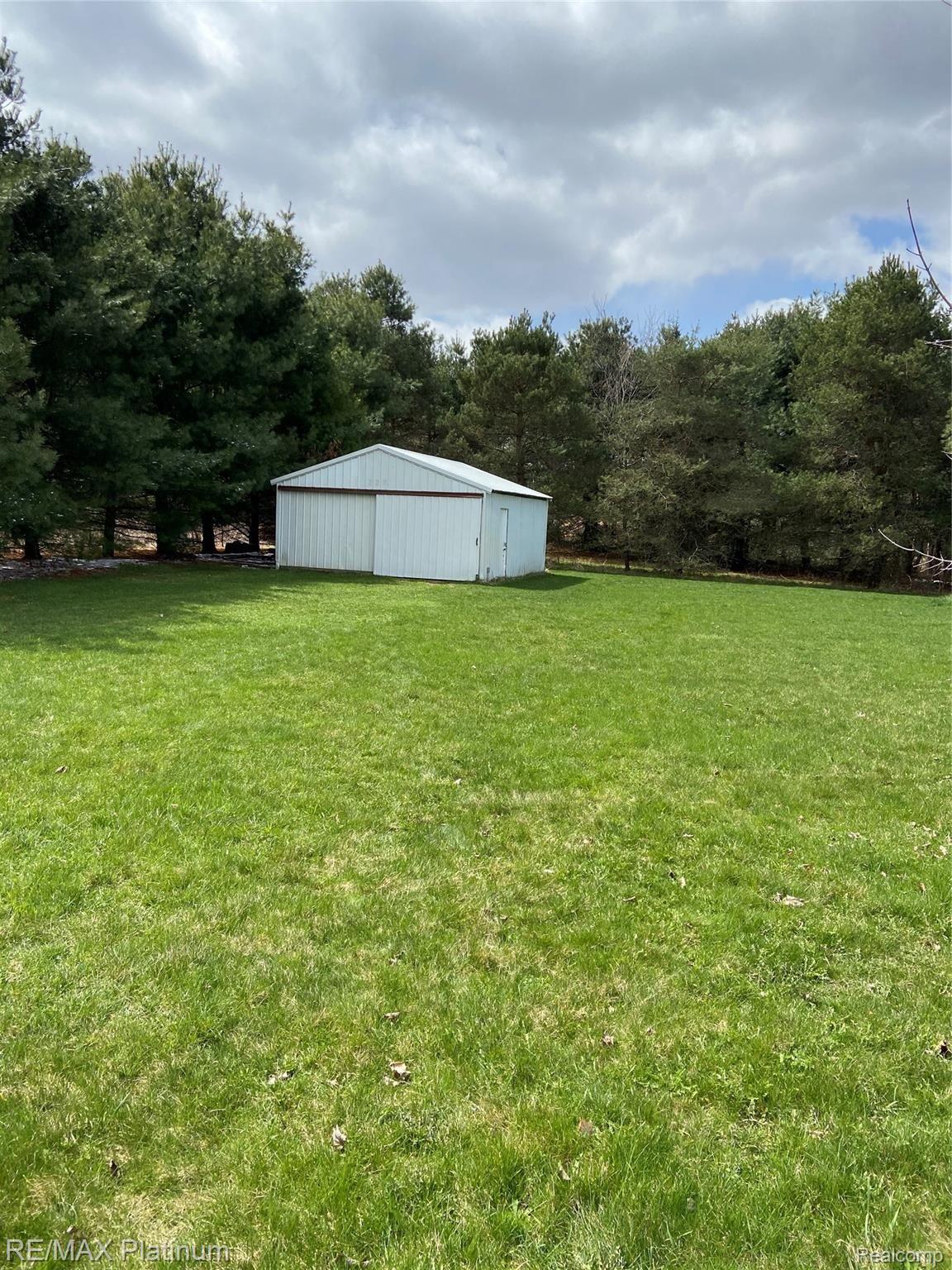 727 North Hacker Road Howell, MI 48843 - Photo 28 of 28 pole barn.jpeg