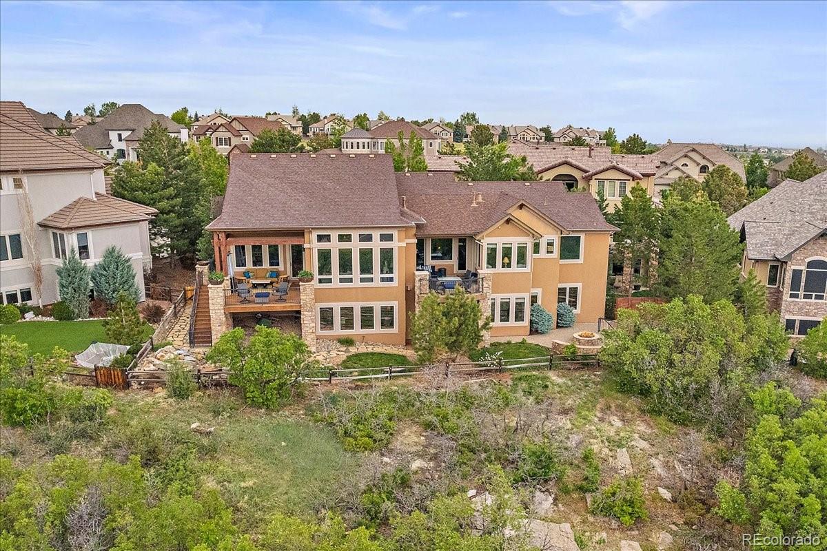 1254 Buffalo Ridge Road Castle Pines, CO 80108 - Photo 39 of 40 an aerial view of a house