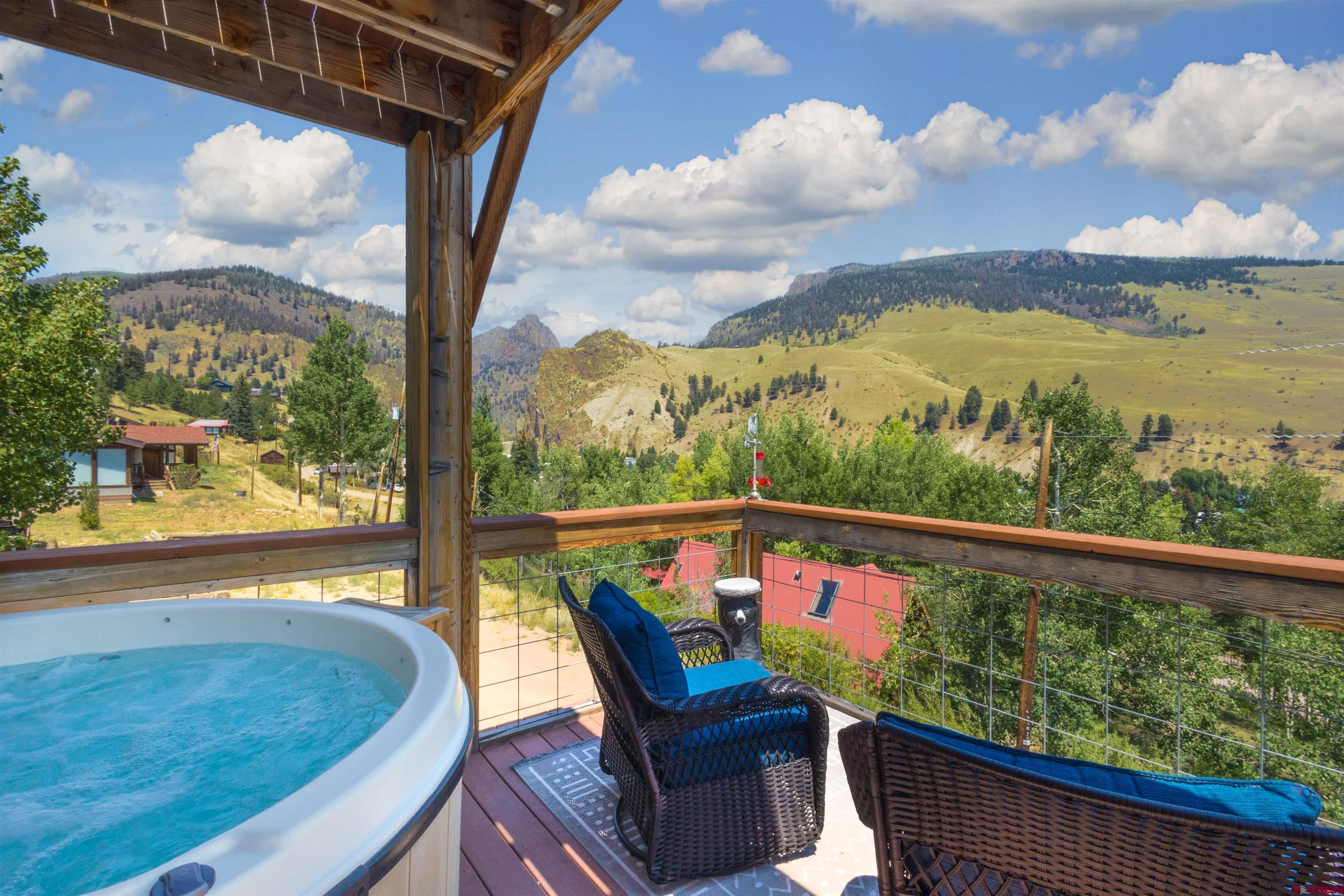 301 West 3rd Street Creede, CO 81130 - Photo 21 of 28 a view of a two chair in the balcony